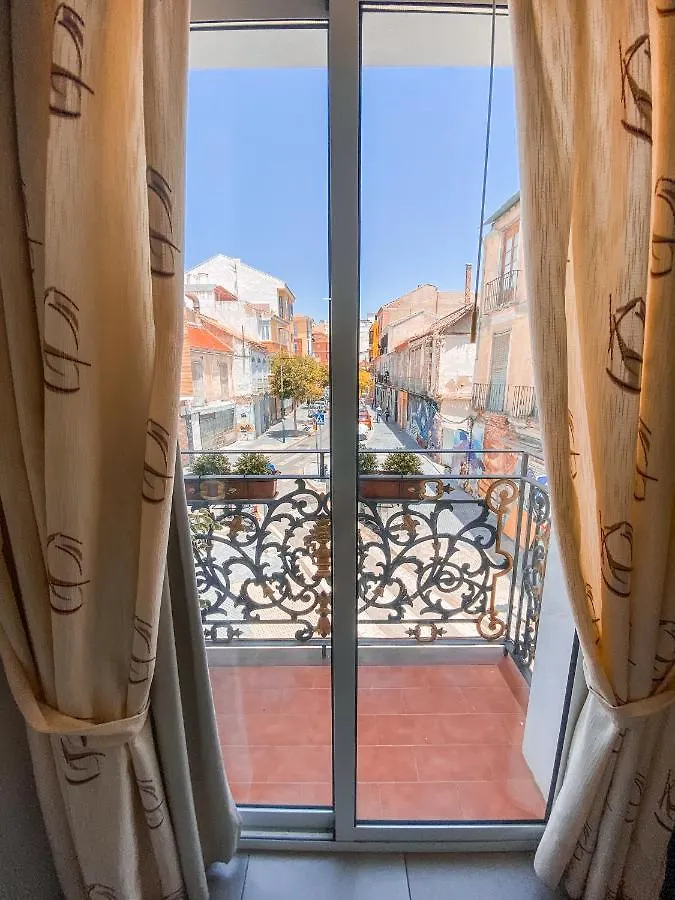 Hostal Bruselas Малага Хостел